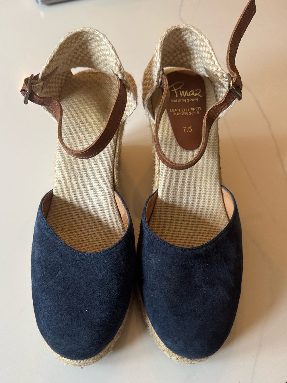 Blue suede wedge espadrille.